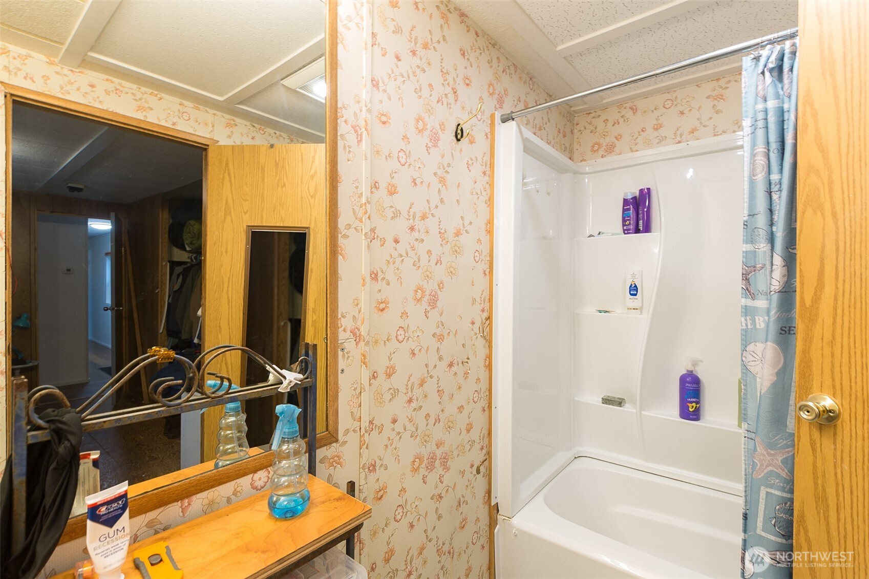 501 McCarver Road Port Angeles, WA 98362 - Photo 13 of 36 a bathroom with a tub and a shower