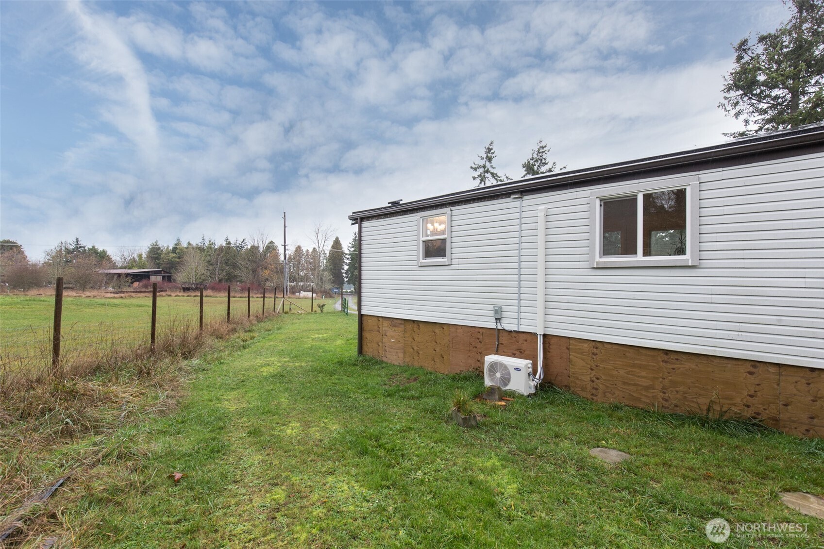 501 McCarver Road Port Angeles, WA 98362 - Photo 24 of 36 a backyard of a house with lots of green space