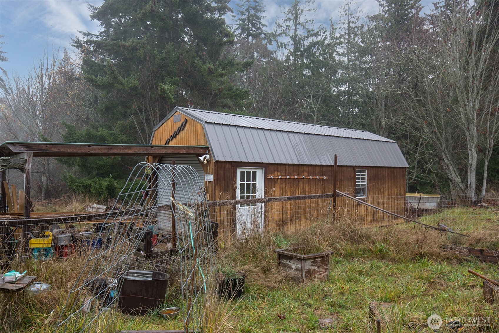 501 McCarver Road Port Angeles, WA 98362 - Photo 29 of 36 an outdoor view of house with swimming pool and yard