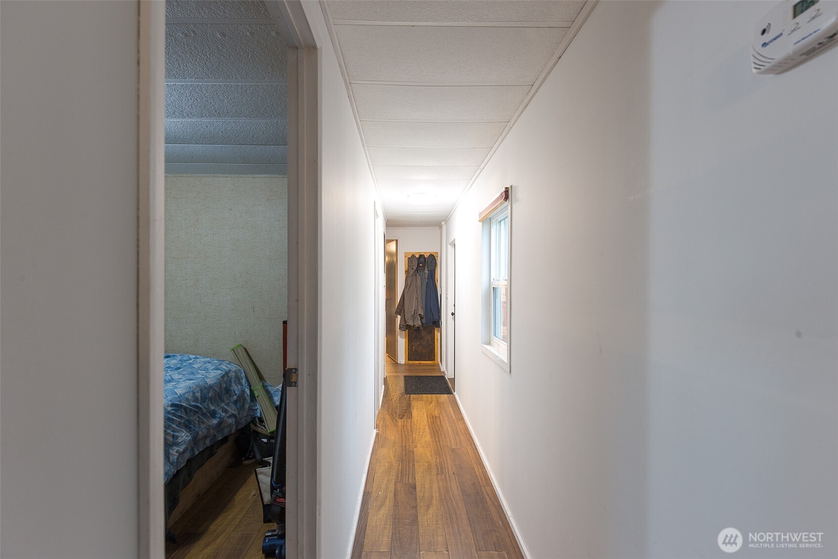 501 McCarver Road Port Angeles, WA 98362 - Photo 9 of 36 a view of hallway with wooden floor