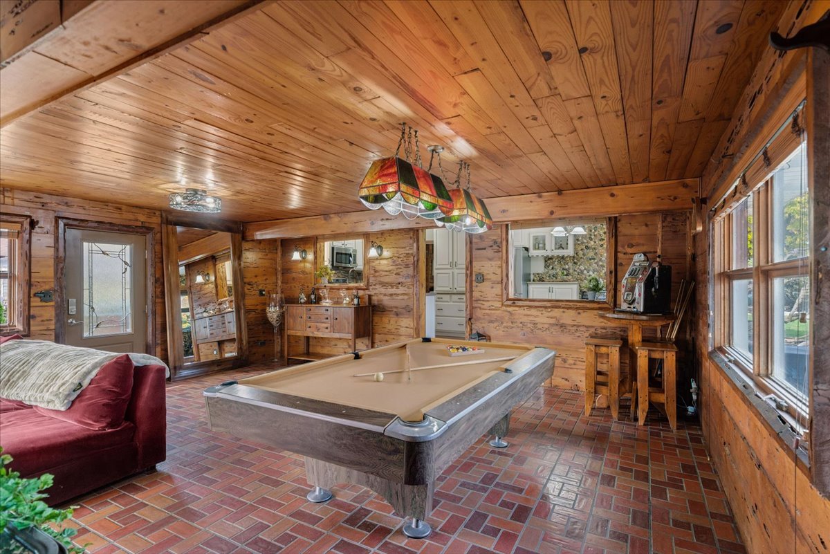 2813 Theresa Avenue Waukegan, IL 60085 - Photo 12 of 23 a living room with furniture a table and large windows