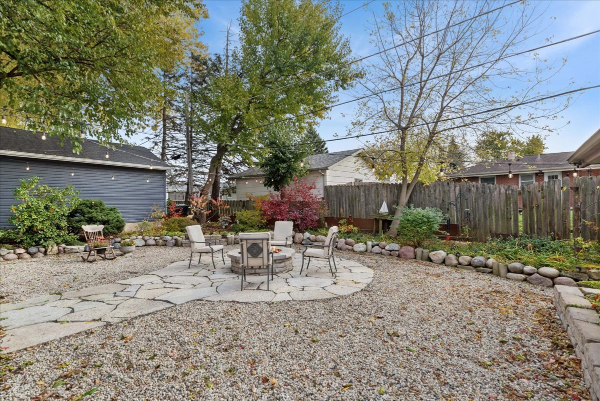 2813 Theresa Avenue Waukegan, IL 60085 - Photo 22 of 23 a view of a chair and table in backyard