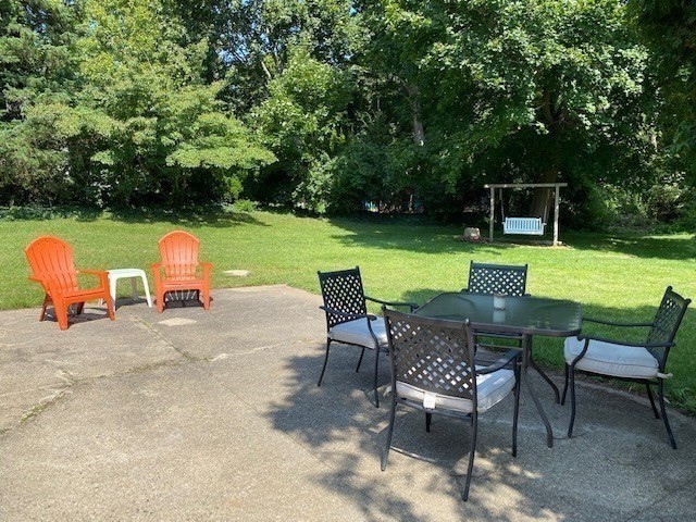 1335 County Road Bourne, MA 02534 - Photo 8 of 27 a view of backyard with seating area and green space