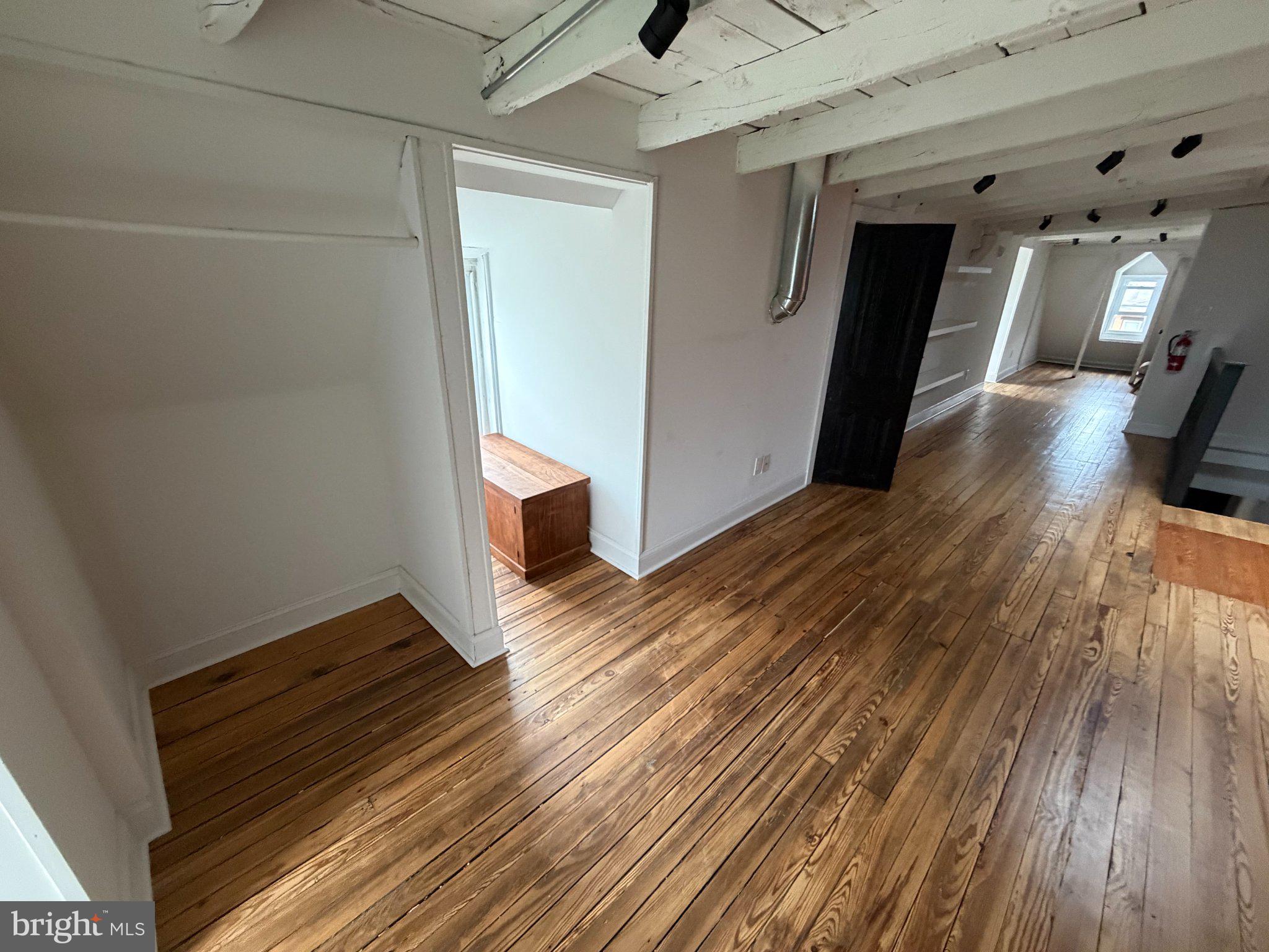 815 South 49th Street Philadelphia, PA 19143 - Photo 50 of 72 a view of a room with wooden floor