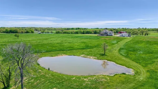 a view of a golf course with a garden