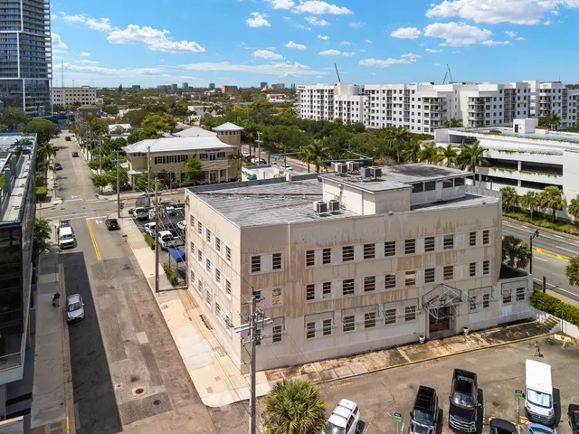 a large building with a street