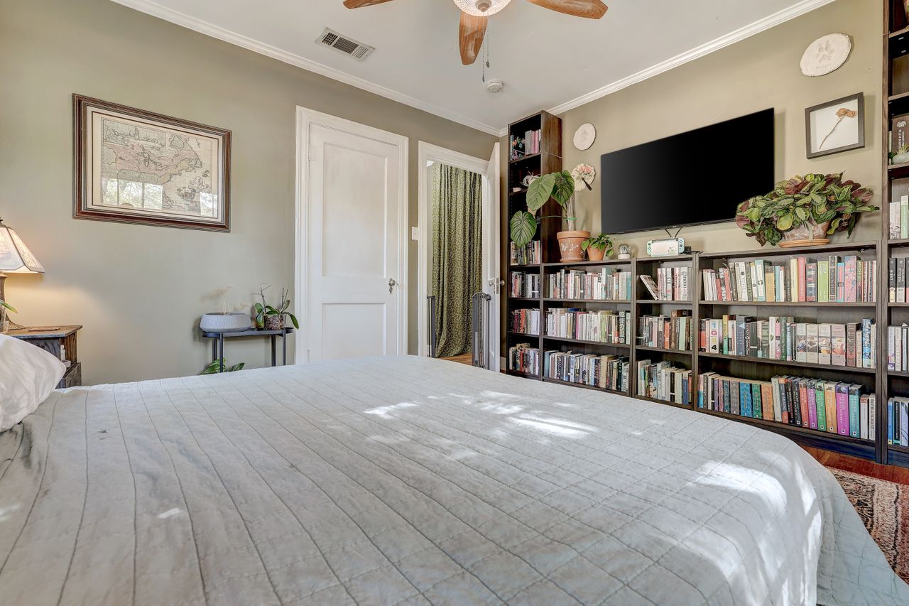 809 East 44th Street Austin, TX 78751 - Photo 24 of 37 Bedroom featuring ornamental molding and ceiling fan