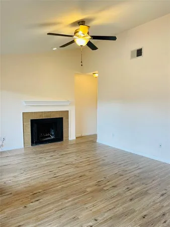a view of a livingroom with a fireplace