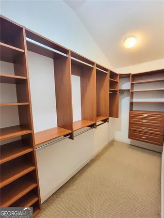 a view of room with walk in closet