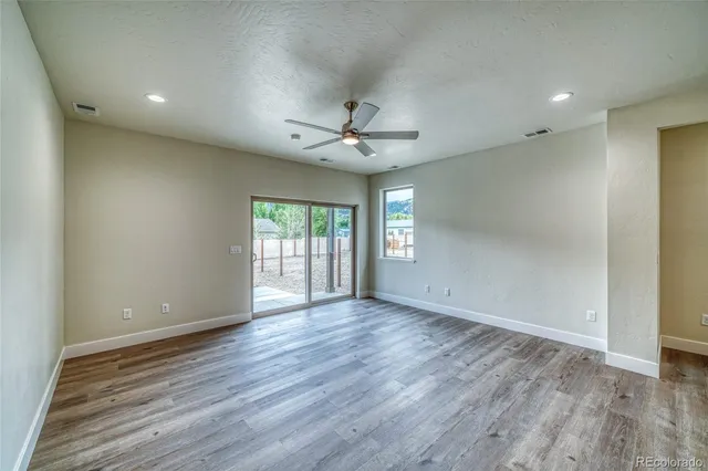 a view of kitchen and natural light