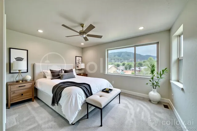 en empty room with windows and ceiling fan