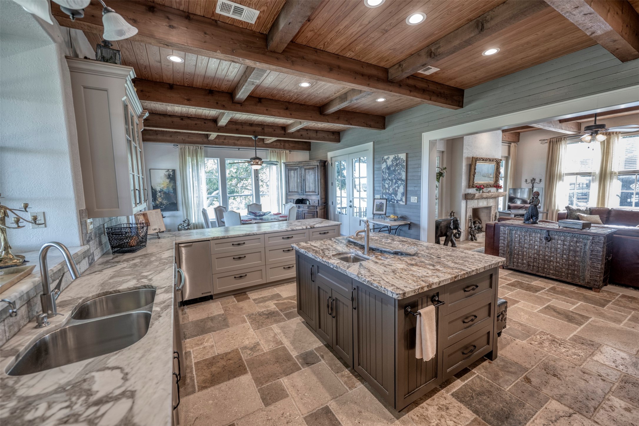 1711 Sempronius Road Chappell Hill, TX 77426 - Photo 14 of 50 a large kitchen with stainless steel appliances granite countertop plenty wooden cabinets counter space a sink and a large window