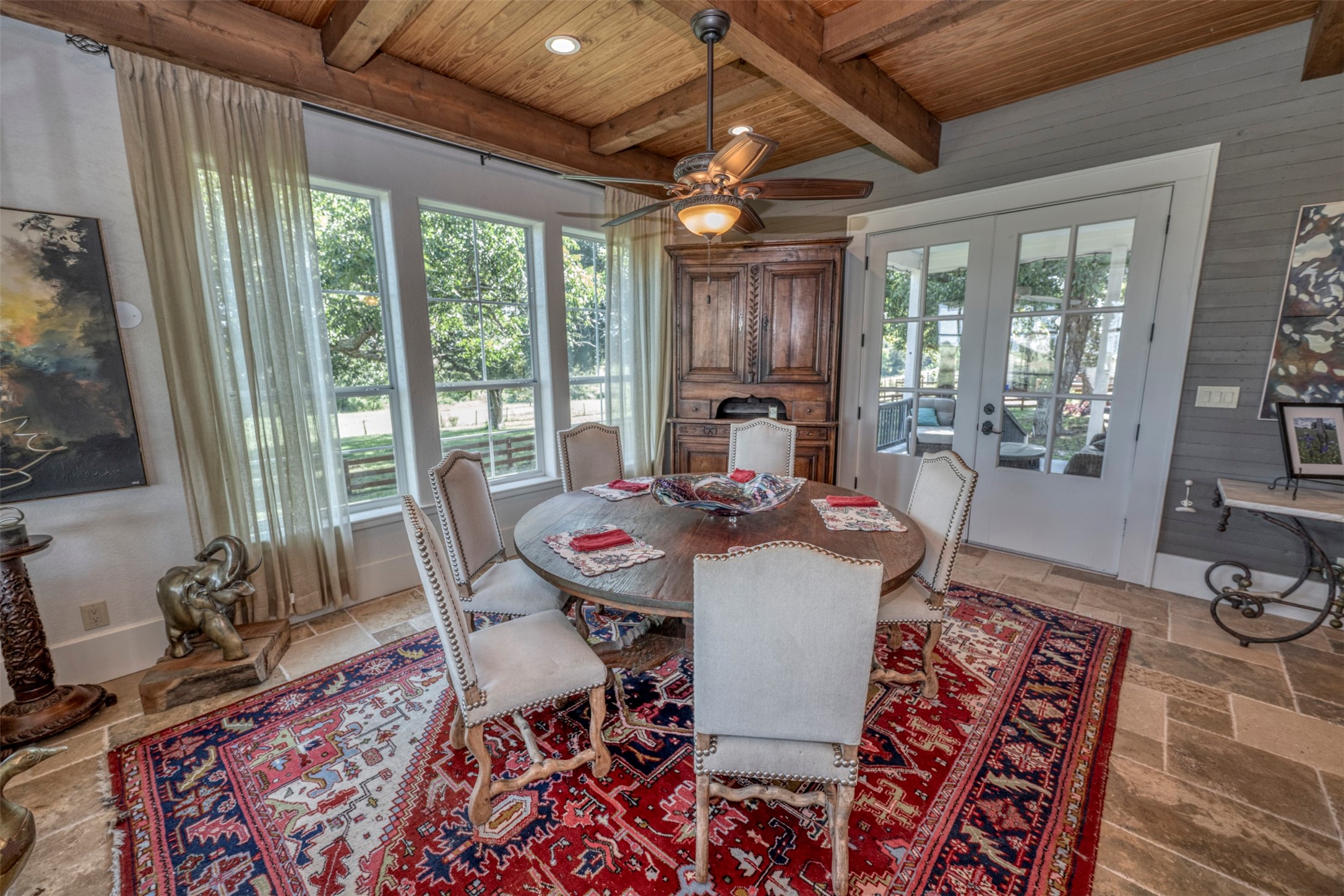 1711 Sempronius Road Chappell Hill, TX 77426 - Photo 15 of 50 a view of a dining room with furniture wooden floor and a chandelier