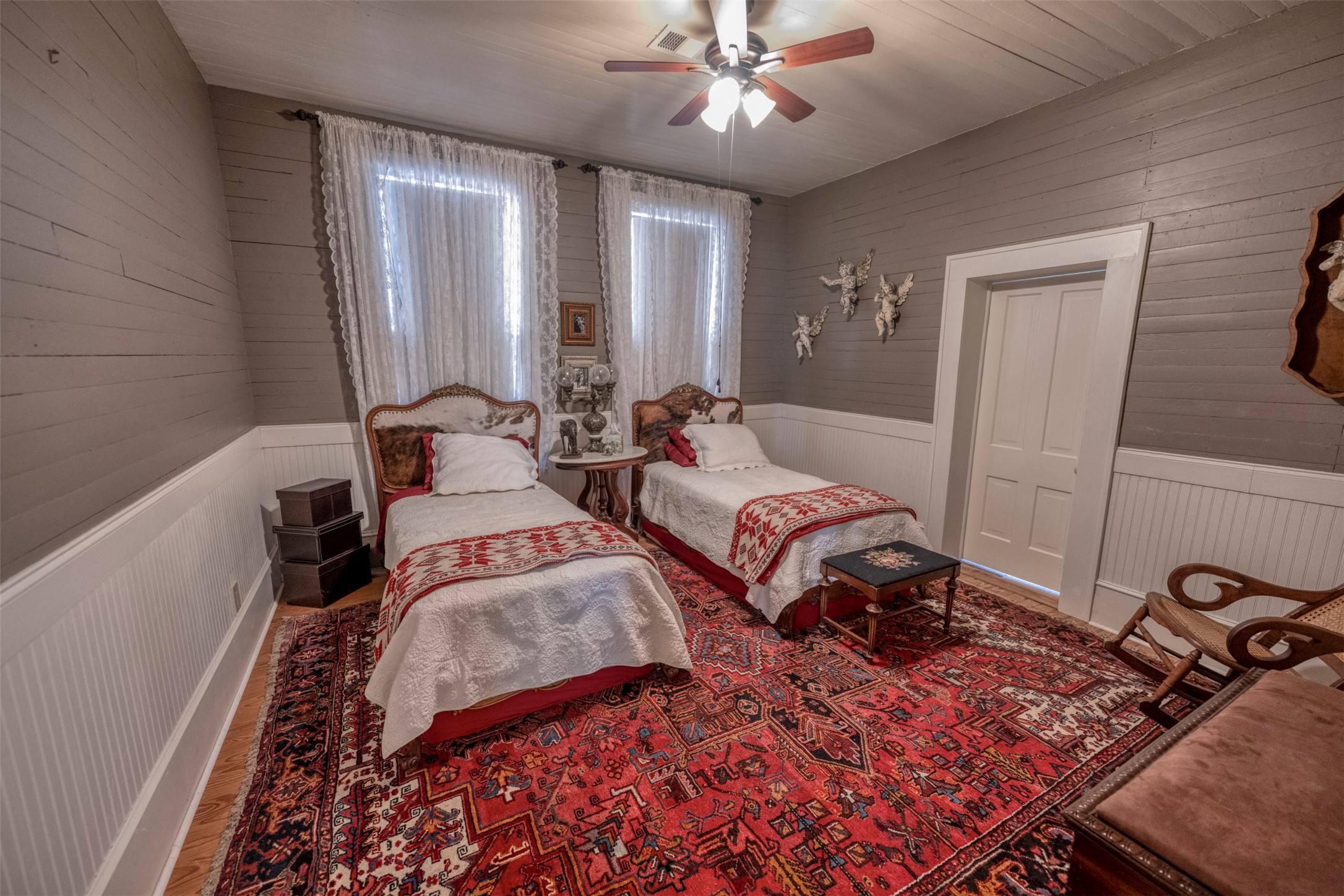 1711 Sempronius Road Chappell Hill, TX 77426 - Photo 18 of 50 a bedroom with two beds and a window