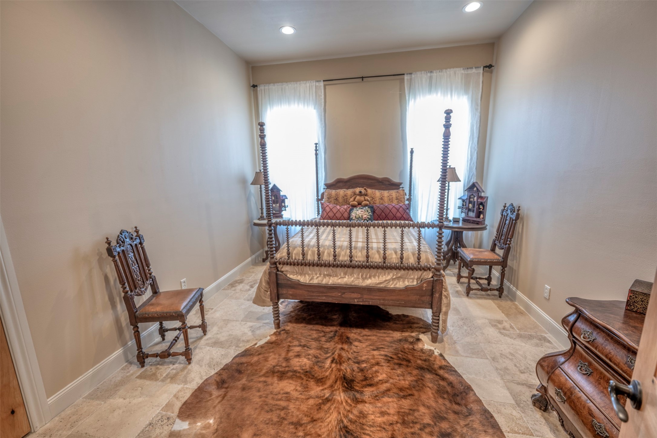 1711 Sempronius Road Chappell Hill, TX 77426 - Photo 40 of 50 a room with a chair and wooden floor