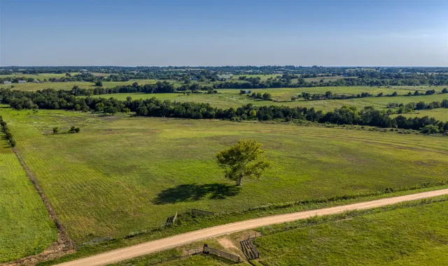 a view of a city with a lake