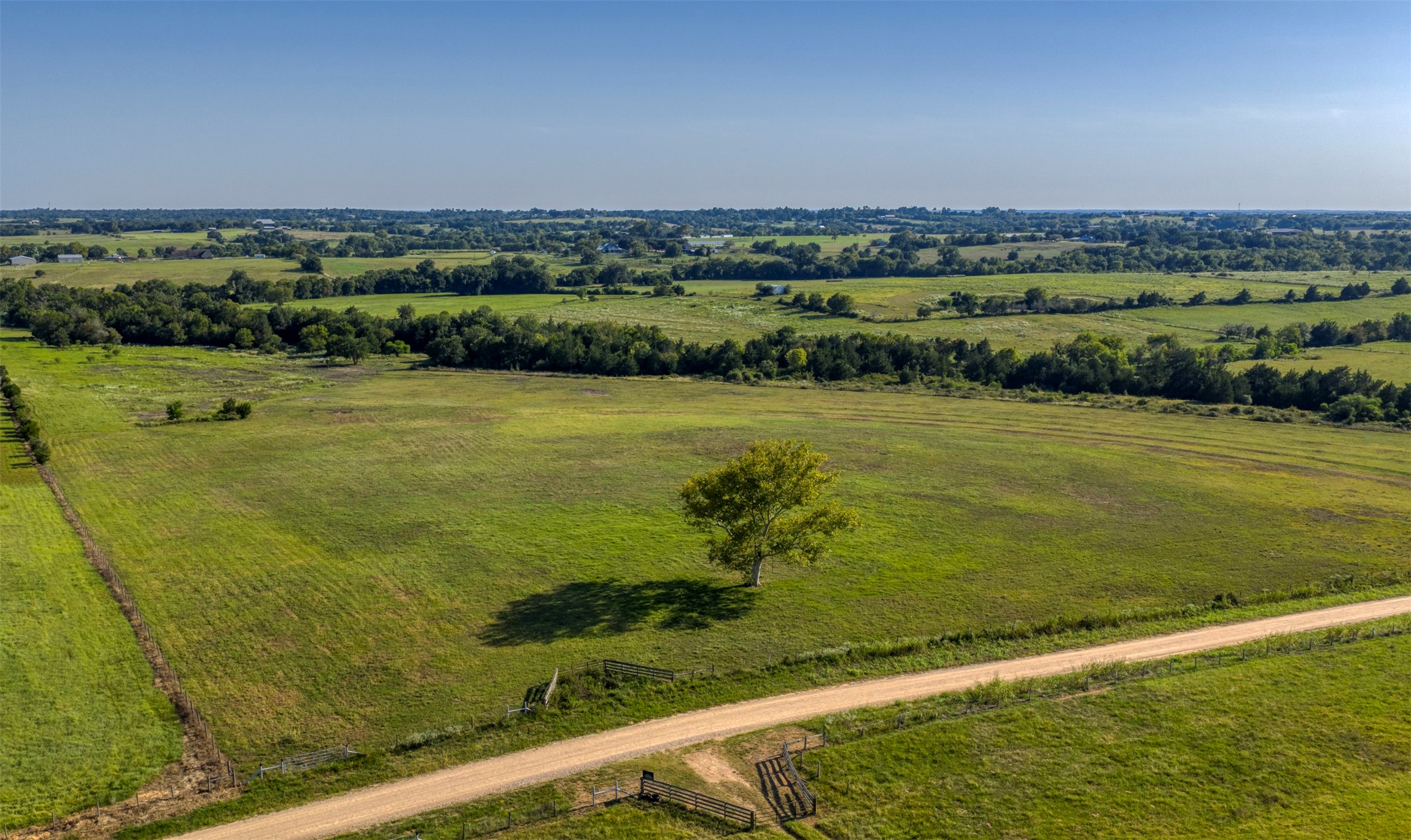 1711 Sempronius Road Chappell Hill, TX 77426 - Photo 4 of 50 a view of a city with a lake