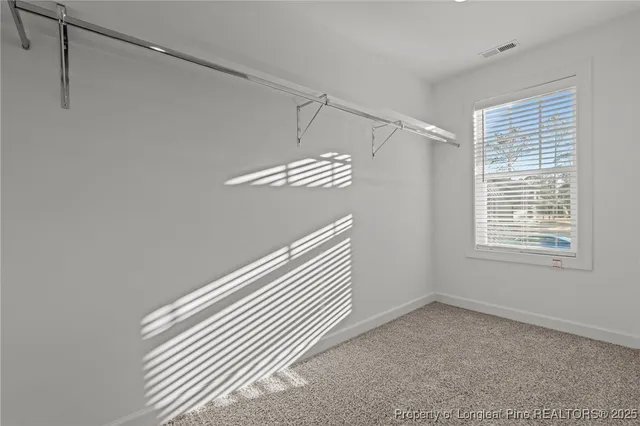 a view of a room with windows