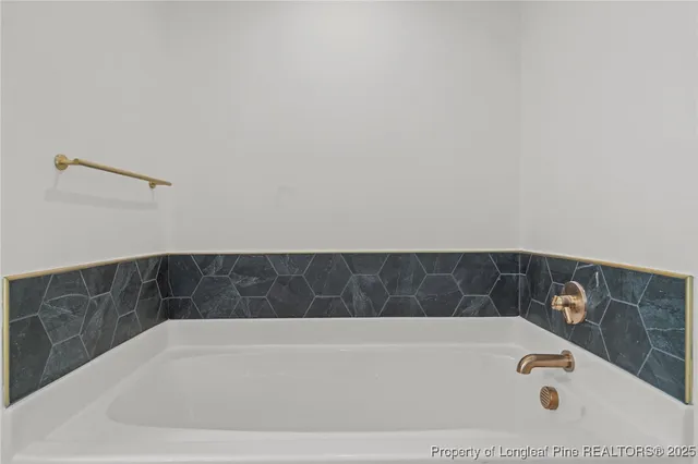 a view of a house with a yard and garage