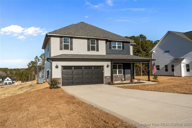 a view of a house with snow on the wall