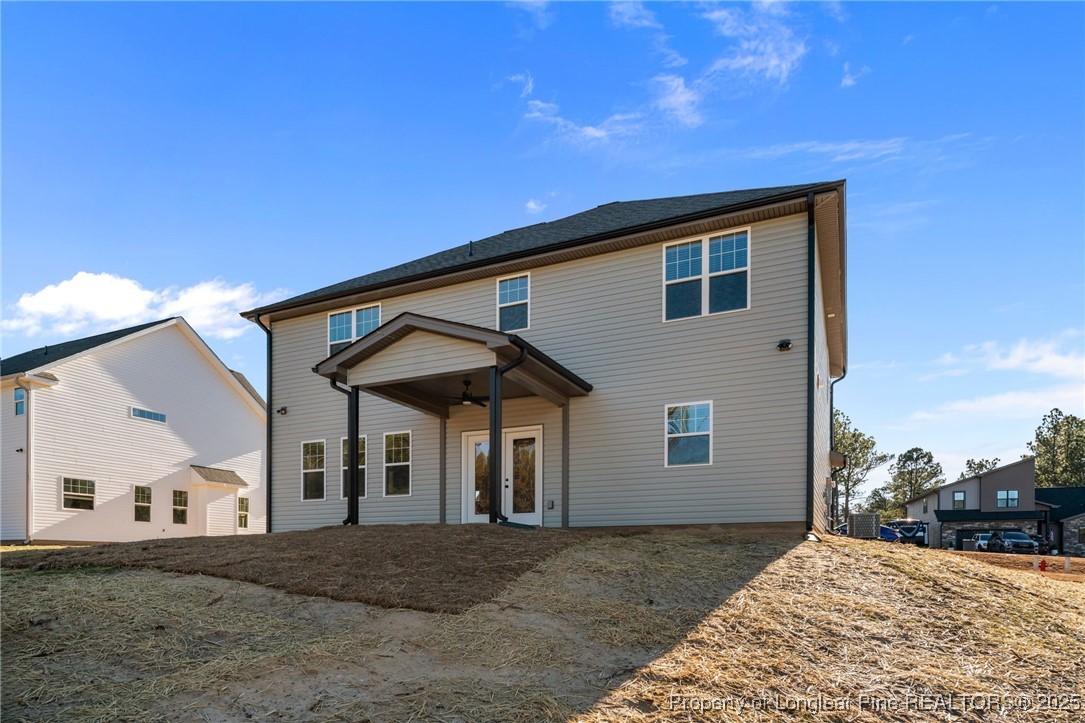 314 Persimmon Tree Drive Cameron, NC 28326 - Photo 43 of 46 a front view of a house with a yard