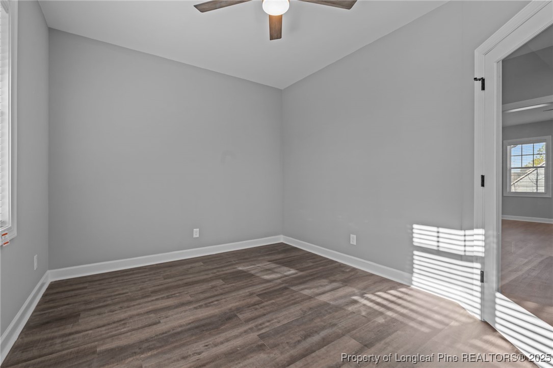 314 Persimmon Tree Drive Cameron, NC 28326 - Photo 6 of 46 a view of empty room with ceiling fan