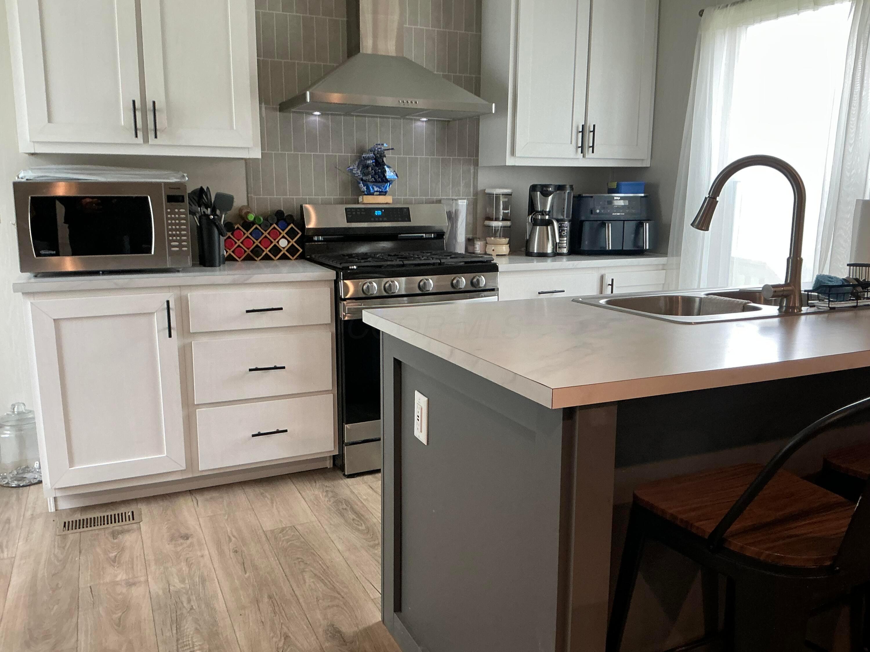 8565 Smith-Calhoun Road, Unit 22 Plain City, OH 43064 - Photo 7 of 18 IMG_1689