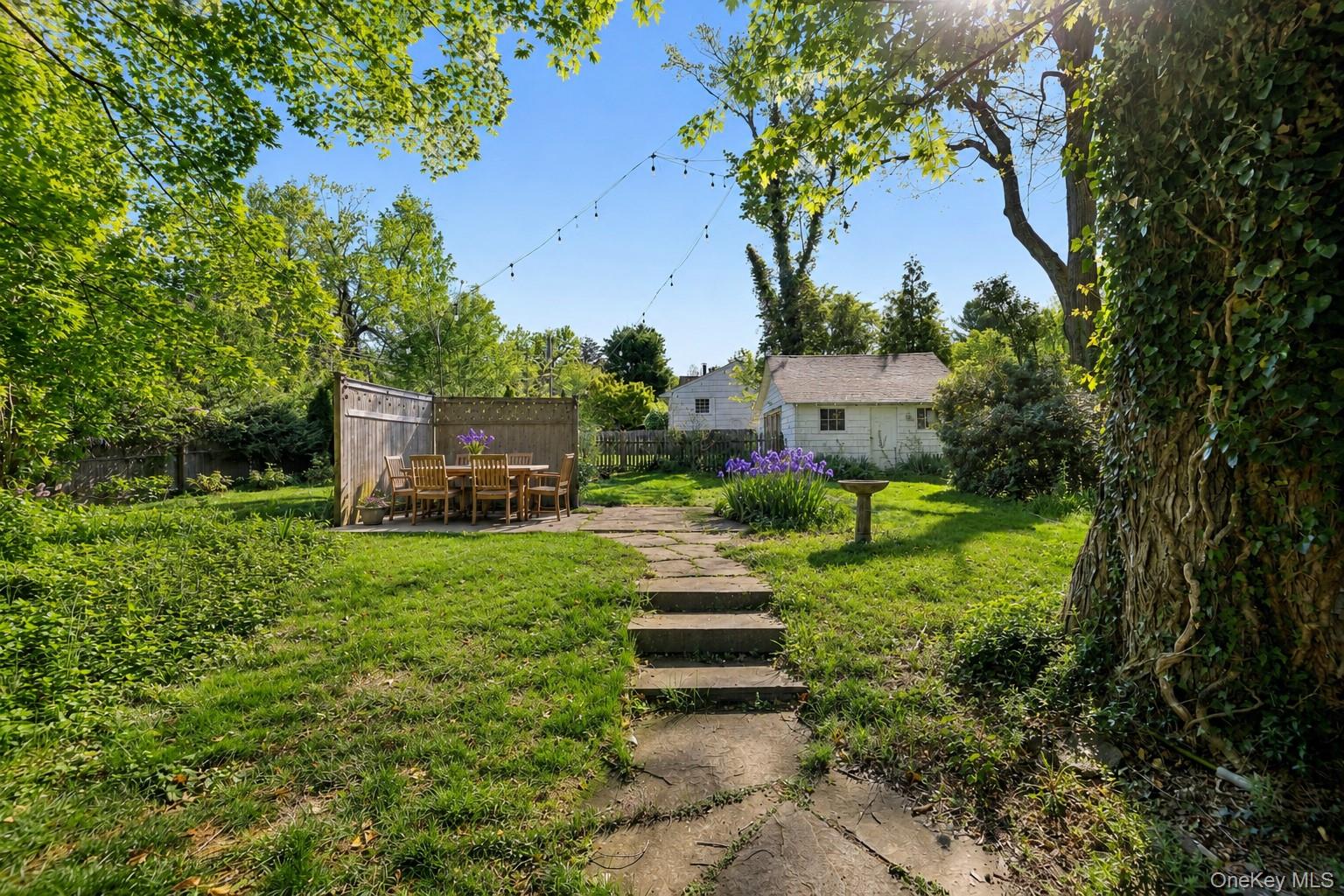 45 Shore Road Setauket, NY 11733 - Photo 33 of 45 Whimsical Backyard with 100 Year Old Squash Court Converted to Patio