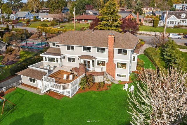 an aerial view of a house with a garden