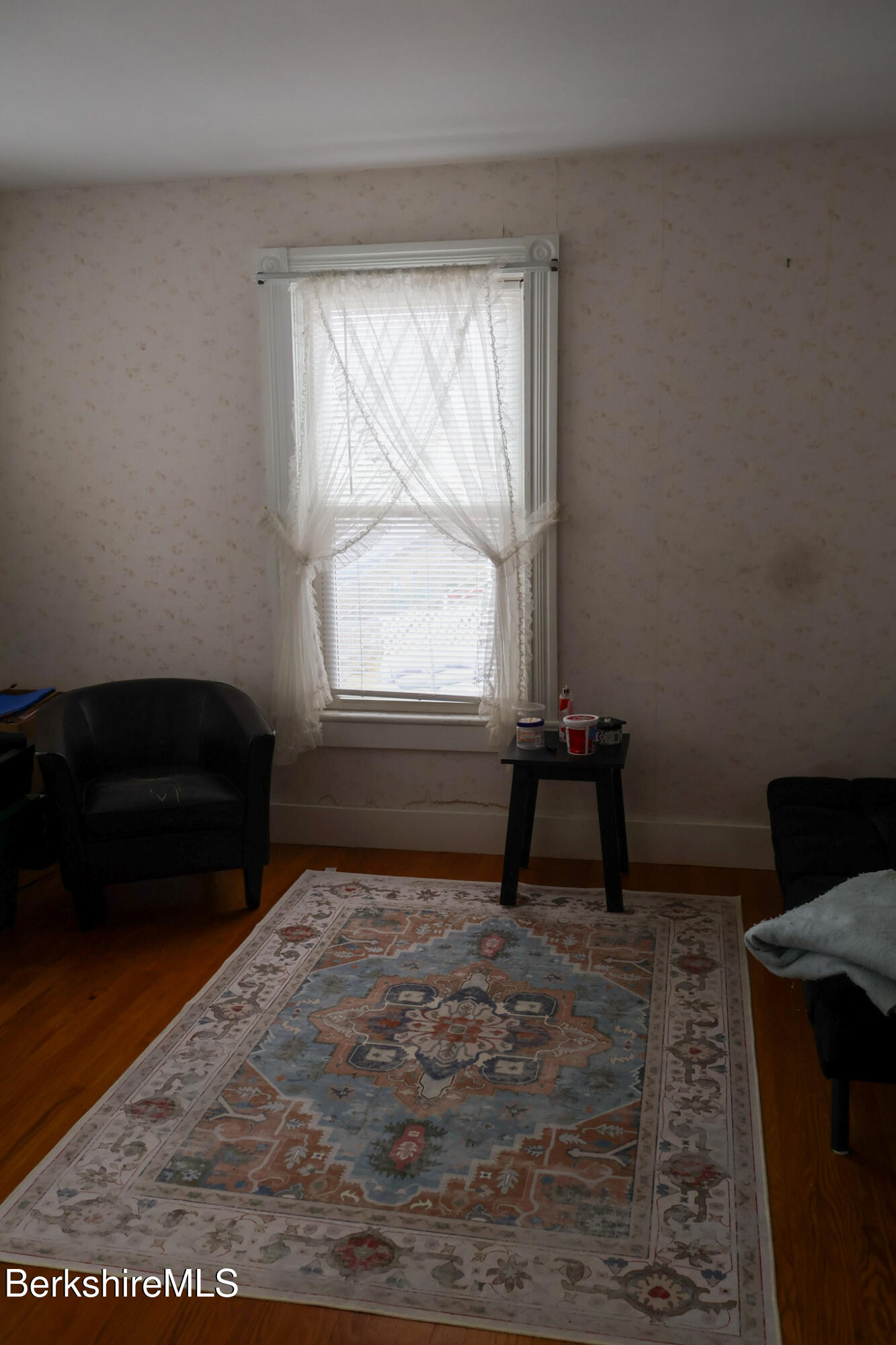 105 Friend Street Adams, MA 01220 - Photo 22 of 27 a living room with a couch and a window
