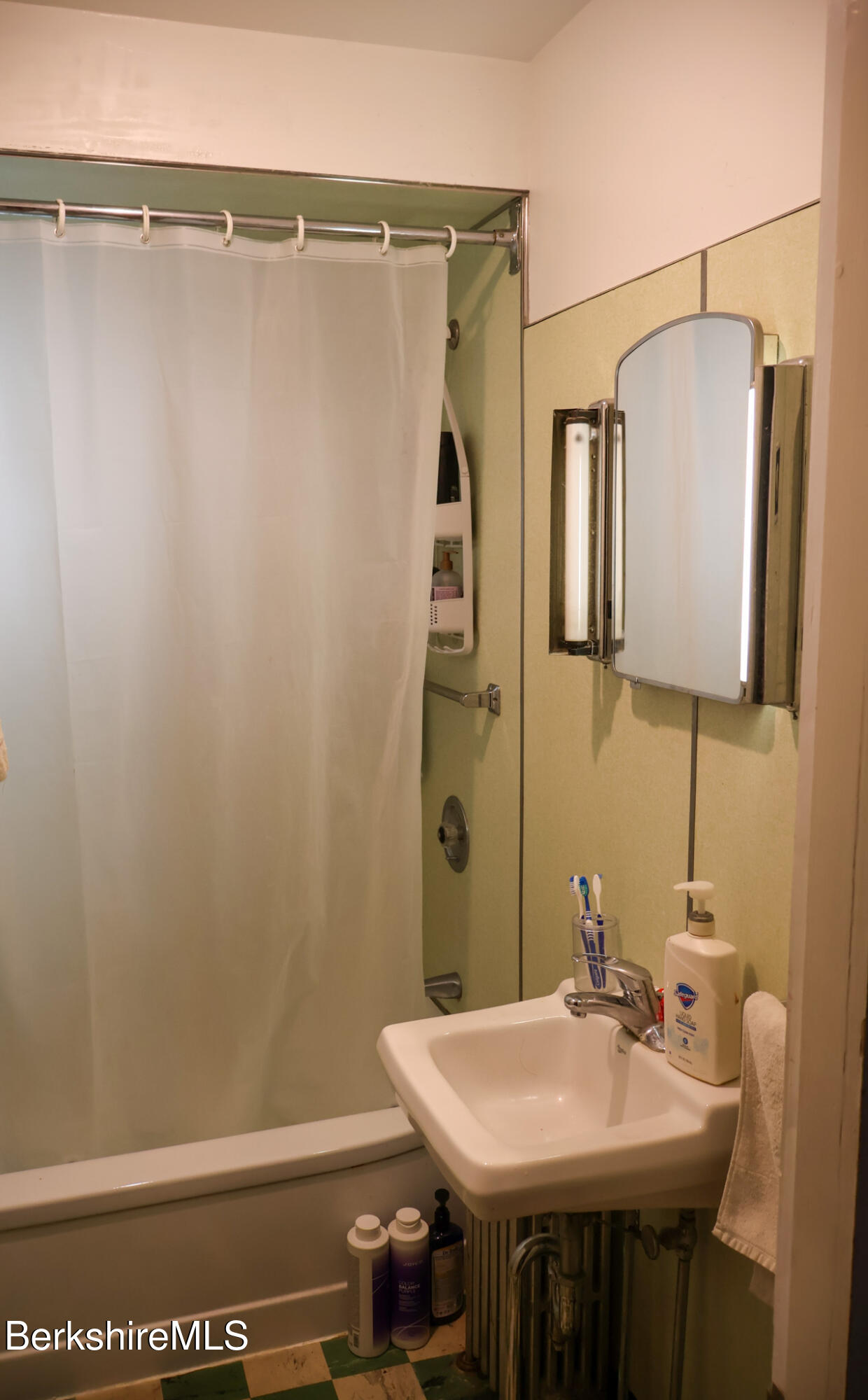 105 Friend Street Adams, MA 01220 - Photo 23 of 27 a bathroom with a sink and mirror