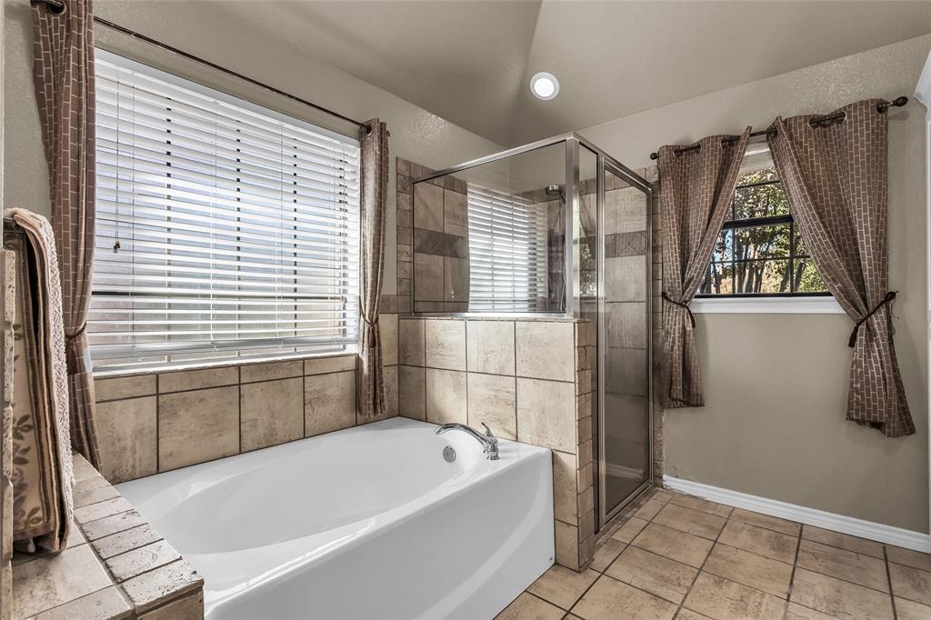 226 King George Road Ponder, TX 76259 - Photo 28 of 39 Full bath with a garden tub, light tile patterned floors, a stall shower, and recessed lighting