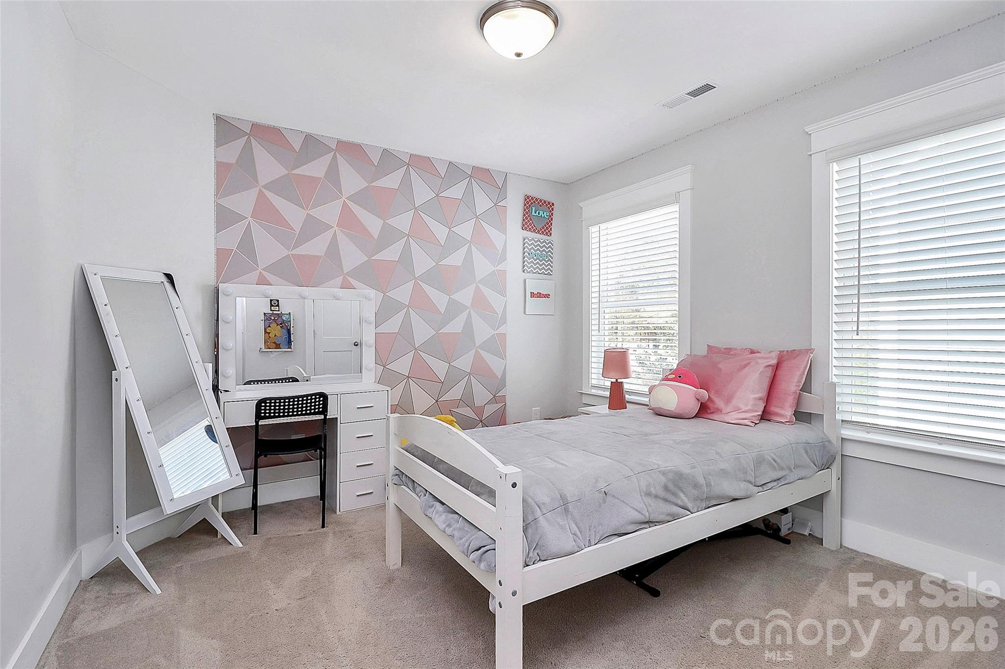 4030 Belle Landing Road, Unit 7 Charlotte, NC 28270 - Photo 14 of 24 a bedroom with a bed and a chair in it