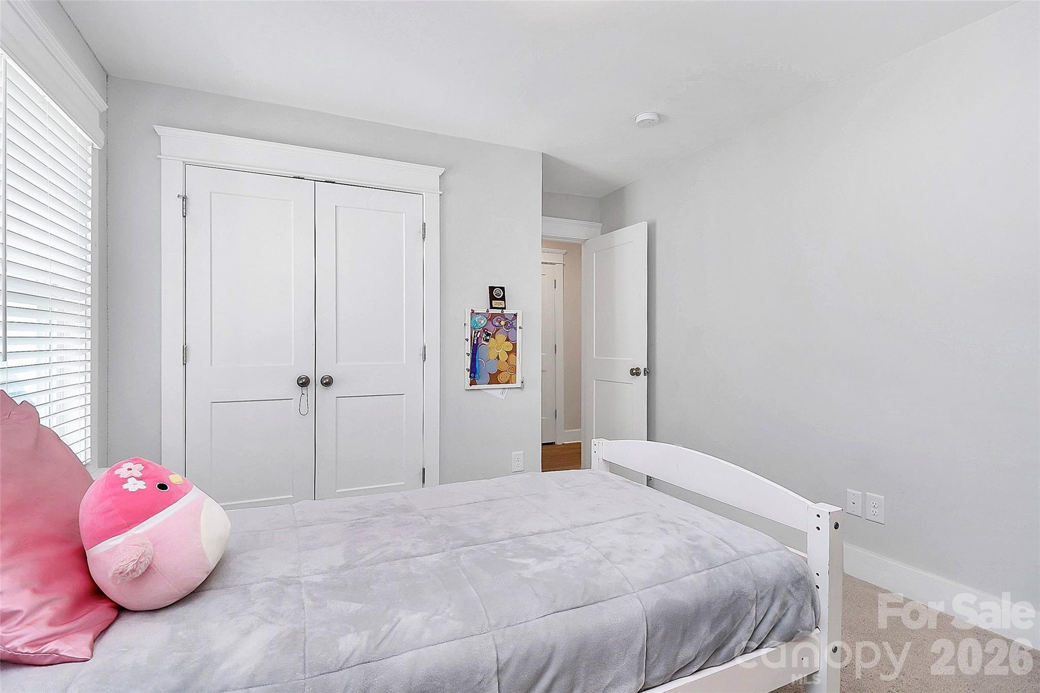 4030 Belle Landing Road, Unit 7 Charlotte, NC 28270 - Photo 15 of 24 a bedroom with a bed and a window