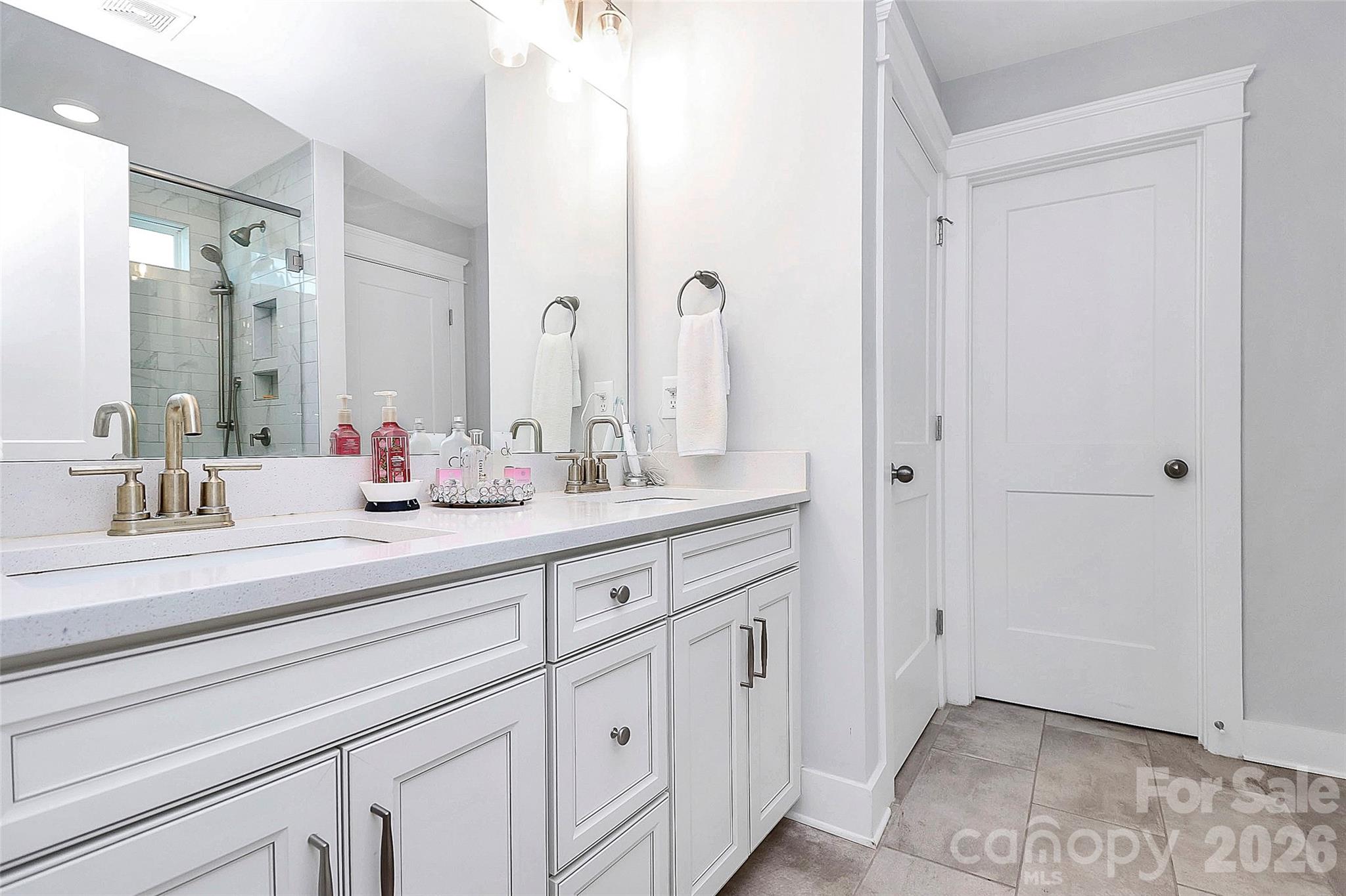 4030 Belle Landing Road, Unit 7 Charlotte, NC 28270 - Photo 6 of 24 a bathroom with a sink and a mirror