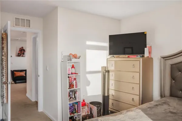a view of a bedroom with baby toys