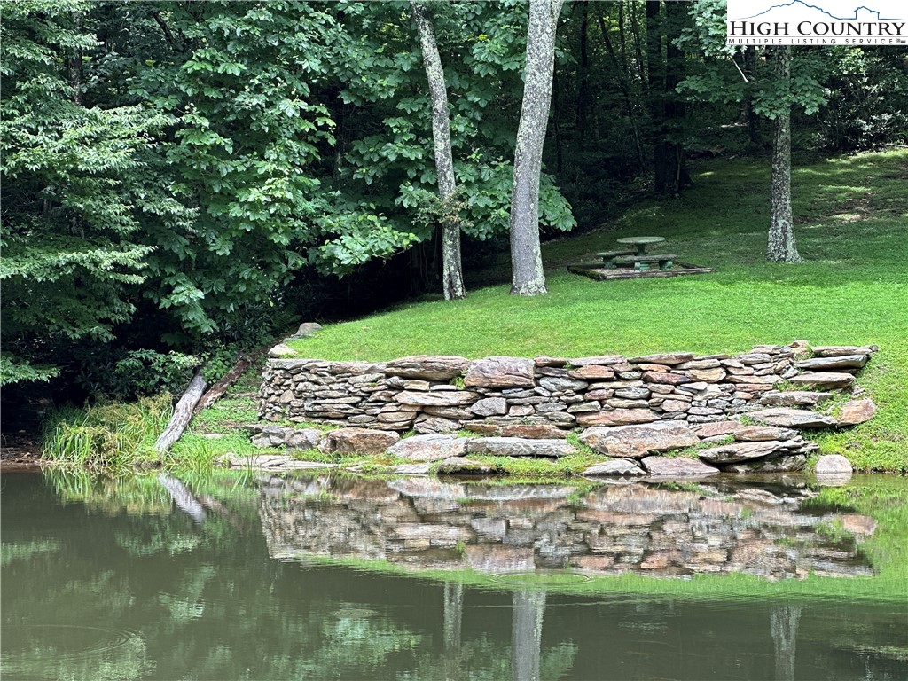 Lot 10 Greystone Drive Boone, NC 28607 - Photo 29 of 30 a view of a lake with a large trees