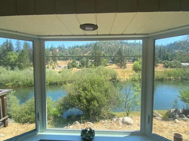 a view of a lake with mountains in the background
