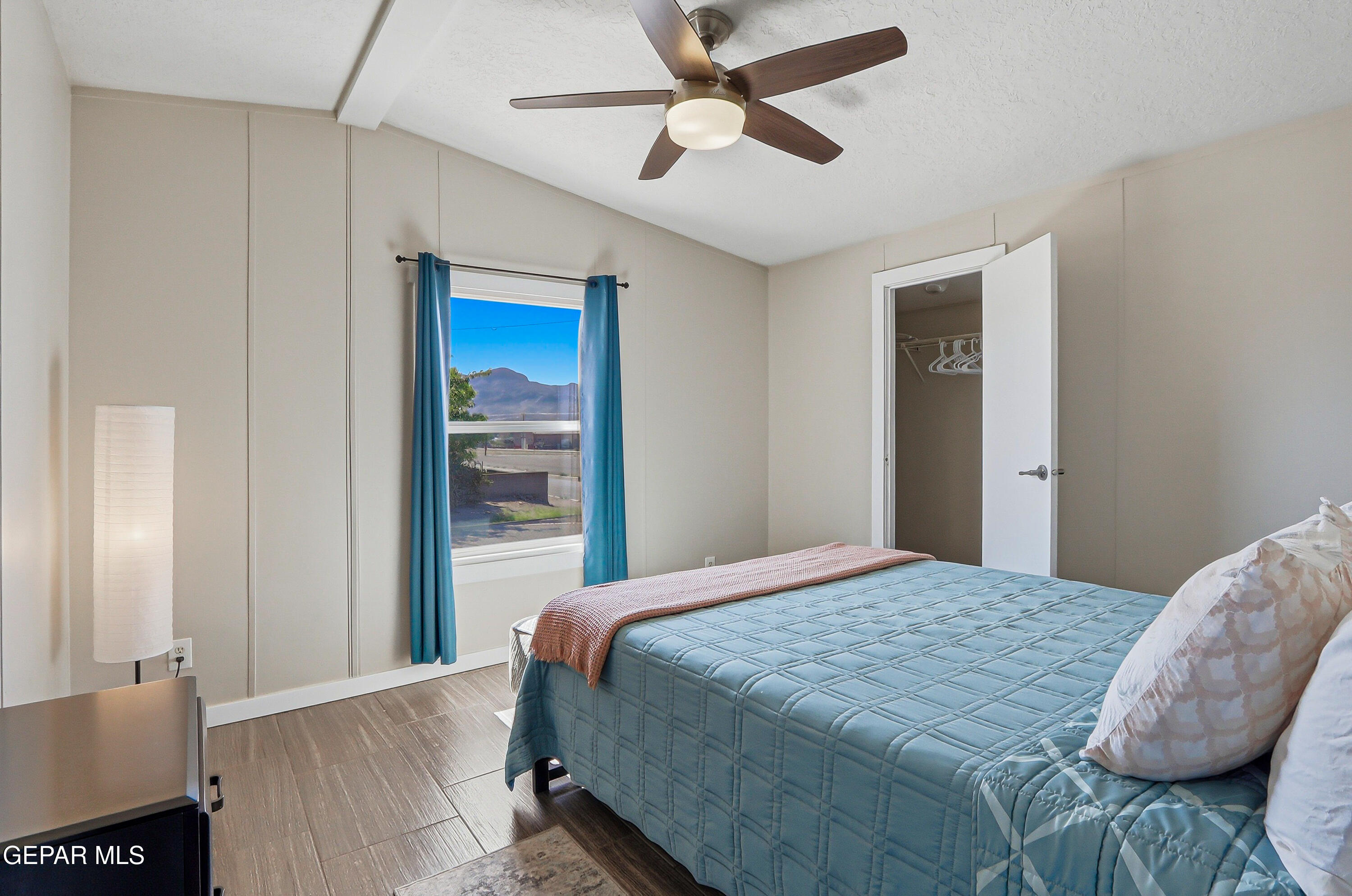 2901 Cook Street Truth or Consequences, NM 87901 - Photo 27 of 31 a bedroom with a bed and a ceiling fan