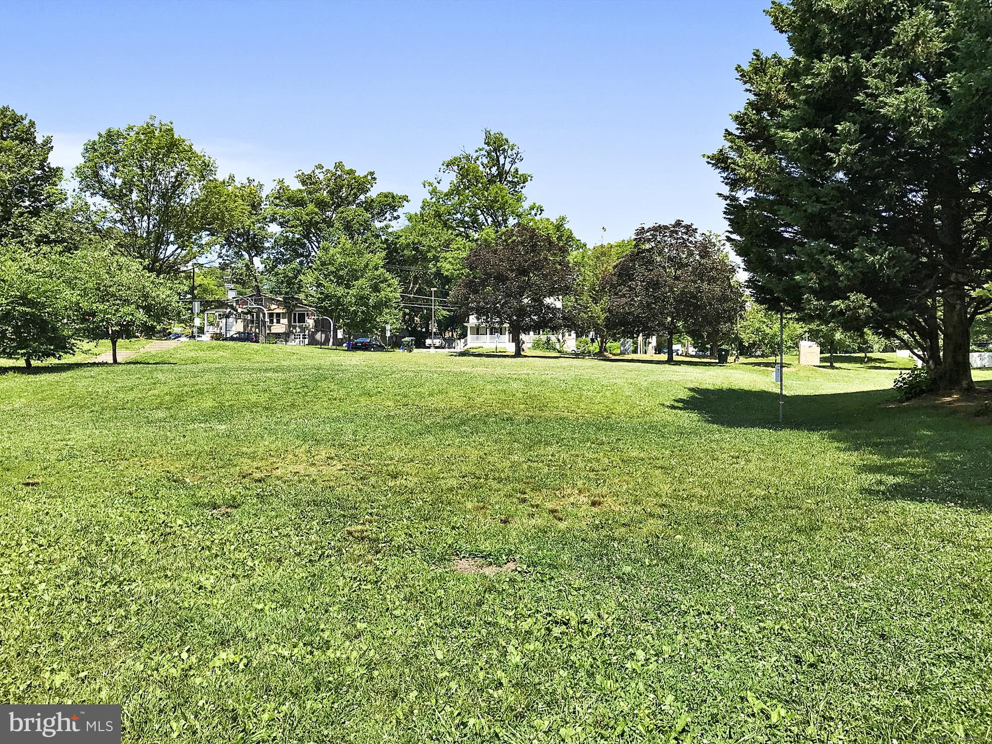 2202 Colston Drive, Unit 2202C Silver Spring, MD 20910 - Photo 35 of 42 a big yard with lots of green space and trampoline