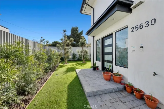 a view of swimming pool with seating space