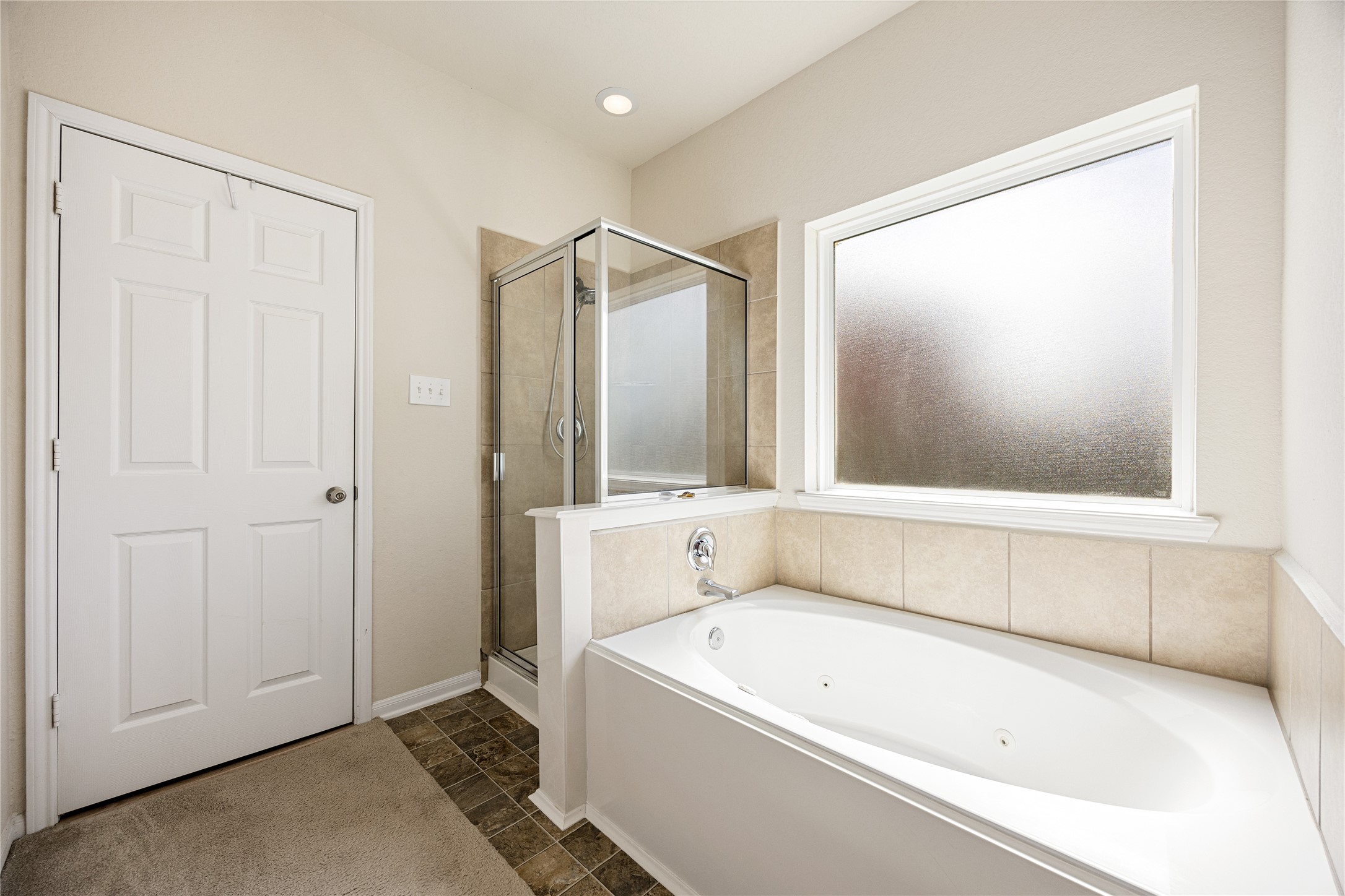 4202 Brightridge Drive Rosenberg, TX 77471 - Photo 12 of 23 a bathroom with a bathtub and a shower