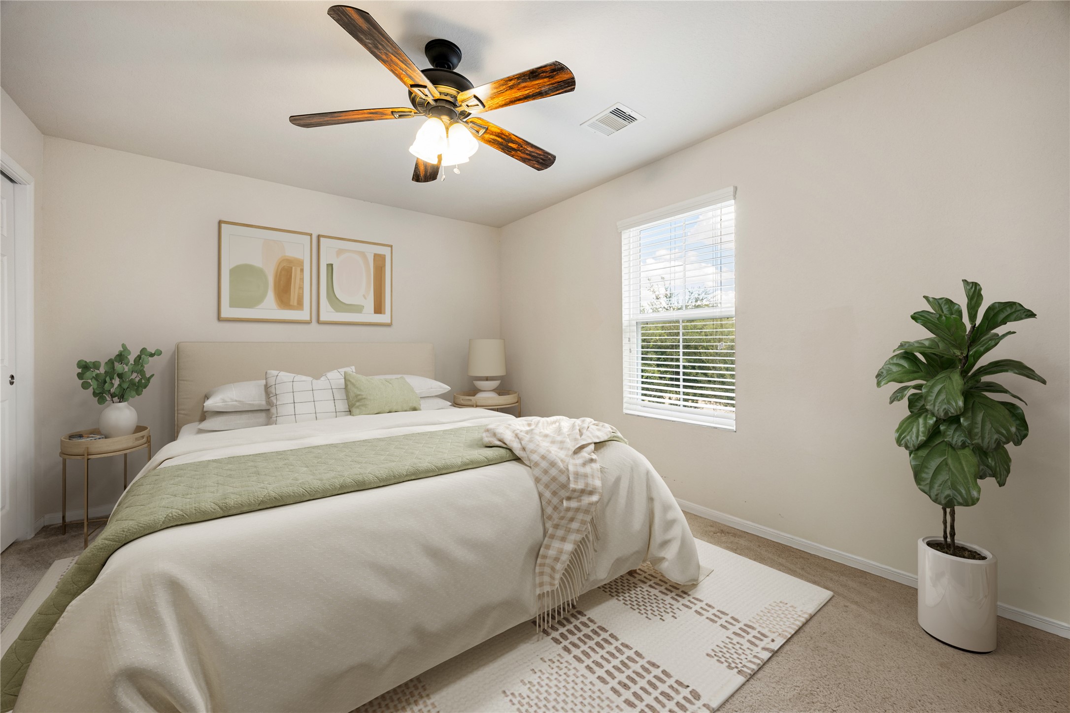 4202 Brightridge Drive Rosenberg, TX 77471 - Photo 16 of 23 a bedroom with a large bed and a potted plant