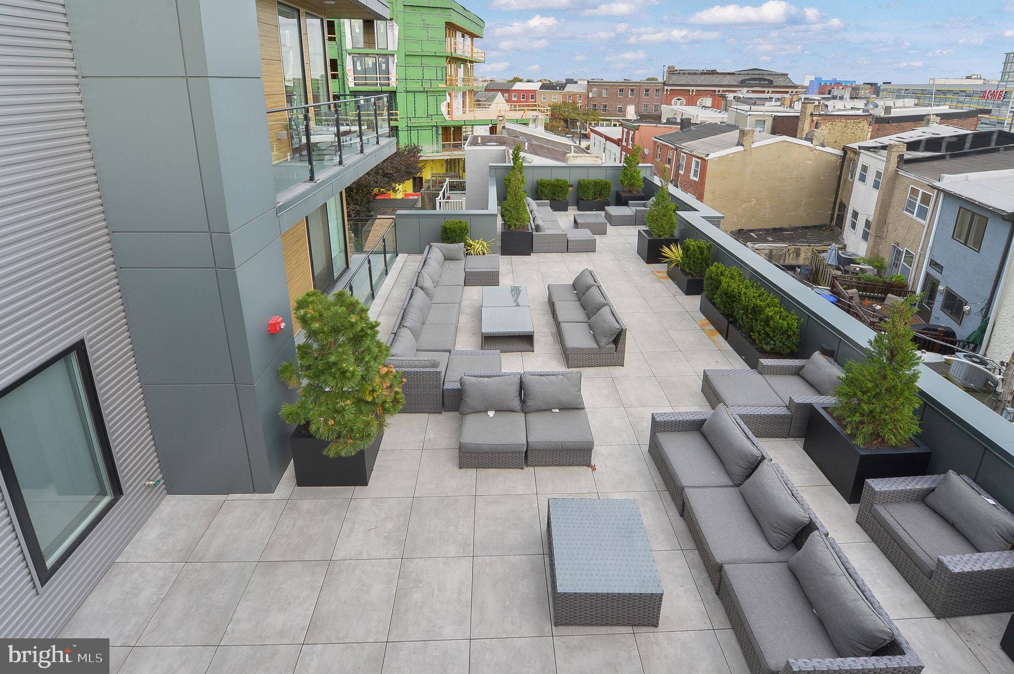 236 West Thompson Street, Unit B501 Philadelphia, PA 19122 - Photo 21 of 48 a view of a terrace with couches