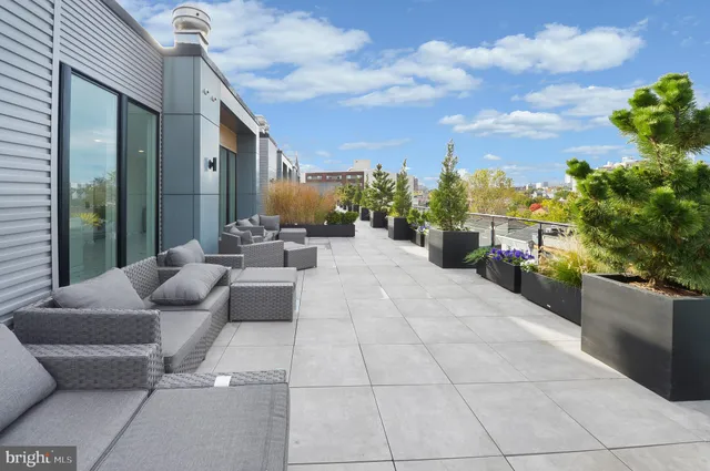 a lobby with furniture and garden