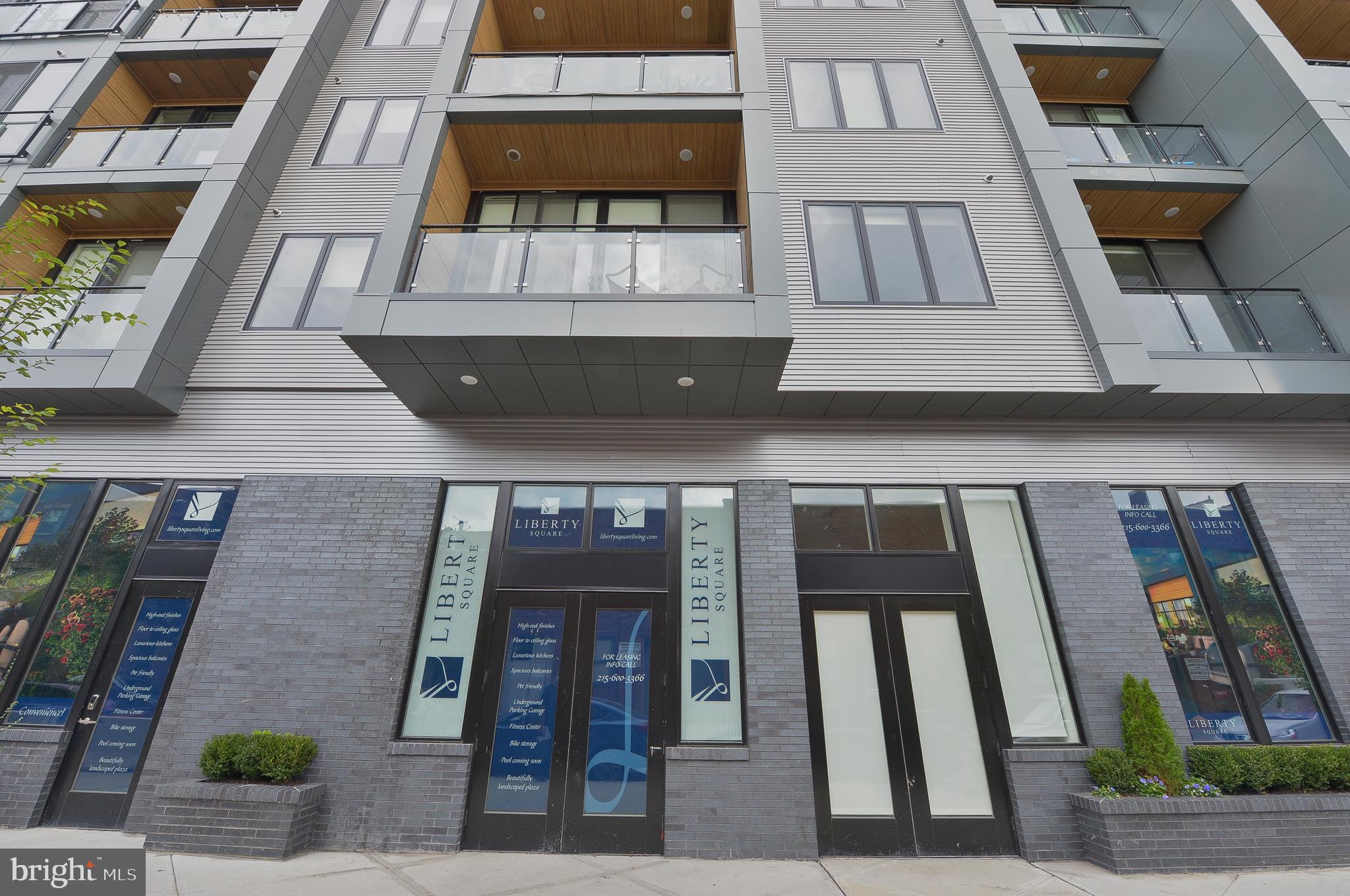 236 West Thompson Street, Unit B501 Philadelphia, PA 19122 - Photo 6 of 48 a front view of a building with glass windows