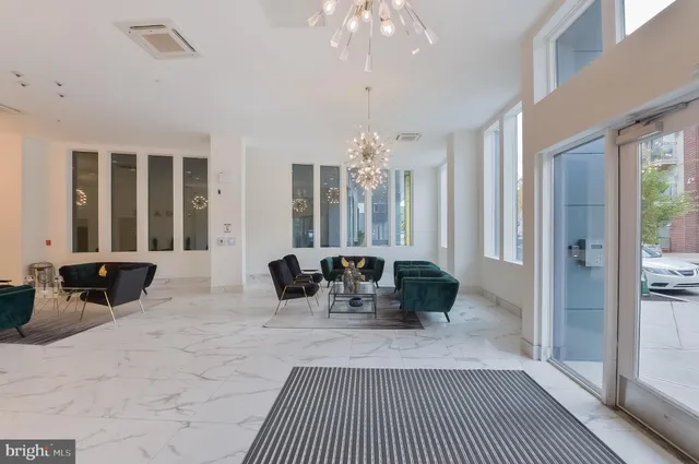 a view of a livingroom with furniture and window