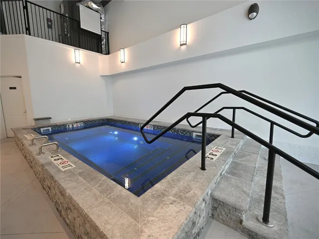 a view of a hall with a dining space