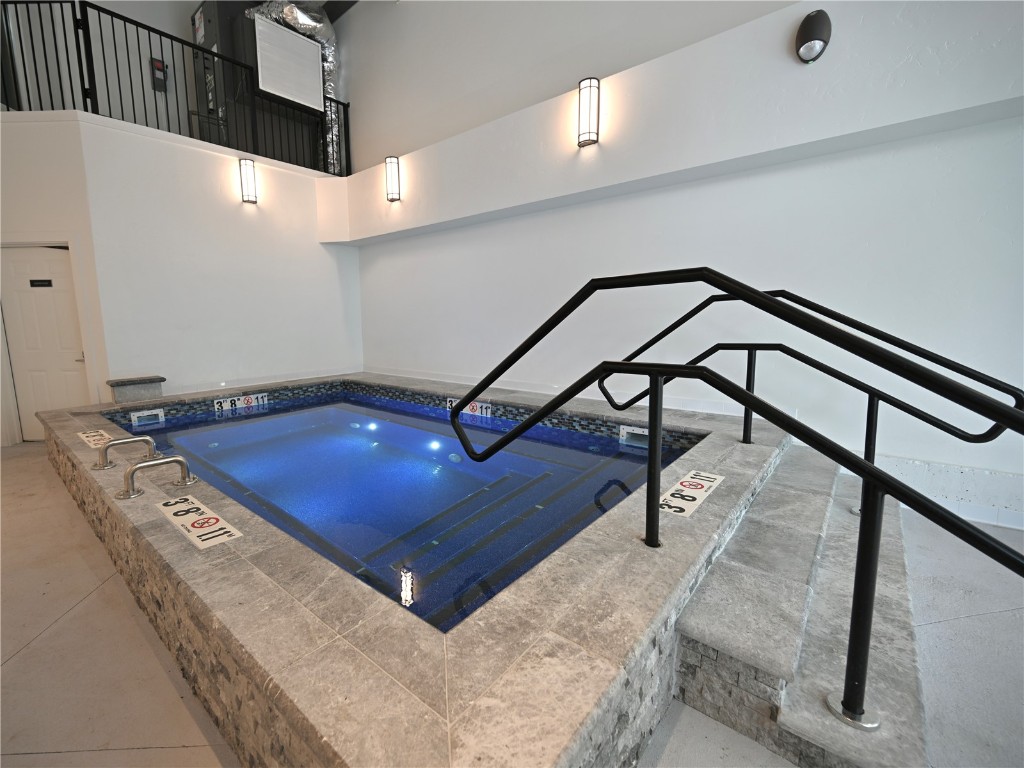 10000 Ryan Gulch Road, Unit 109 Silverthorne, CO 80498 - Photo 16 of 25 a view of a hall with a dining space