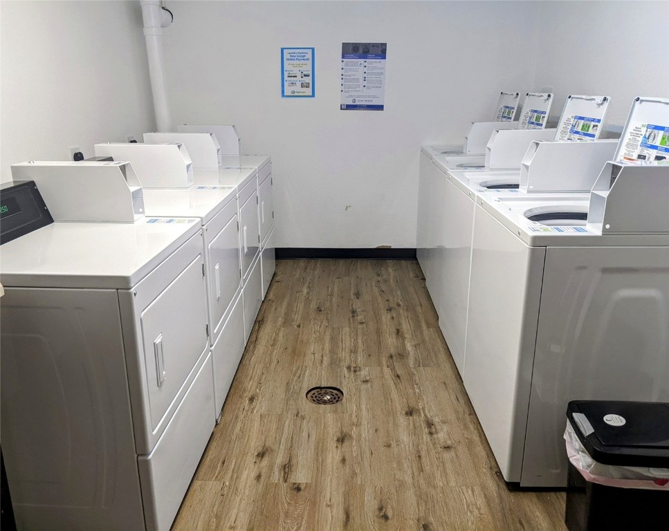 10000 Ryan Gulch Road, Unit 109 Silverthorne, CO 80498 - Photo 24 of 25 a utility room with a sink a washer and dryer